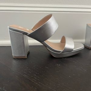 Metallic silver heel
